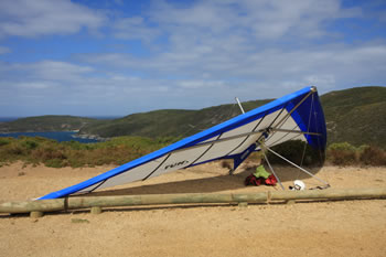 Hang Glider preparing to launch from Shelley Beach platforms